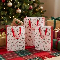 Artikel Geschenktaschen Papier Weihnachten Rot Weiss 24×18×8 cm mit Zuckerstangen und Ilex-Motiv 4 Stück