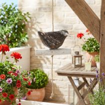 Artikel Hängedeko aus Holz mit Vogelmotiv Braun Weiss 118 cm