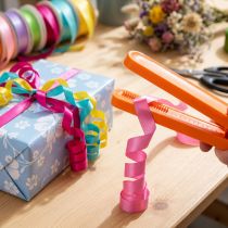 Artikel Splitter und Kräuselbandschneider aus Kunststoff mit Metallzähnen, 14 cm, Orange