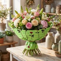 Artikel Manschettenpapier Grün mit Rosenmotiv 25cm x 100m für Blumensträusse