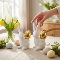 Artikel Keramik Osterhasen mit goldenem Ei, Weiss, H13cm, 2er Set