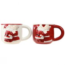 Artikel Set aus zwei Weihnachtstassen Keramik Rot Weiss H8,5cm mit Weihnachtsmann-Motiv