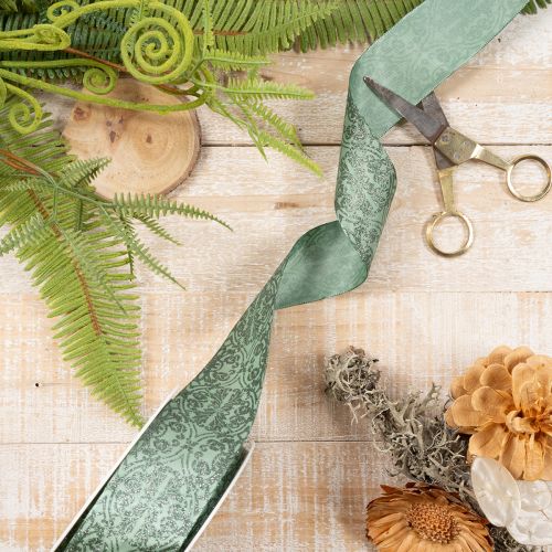 Geschenkband aus Polyester mit floralem Muster 40mm x 15m in Salbeigrün | Floristik24.ch
