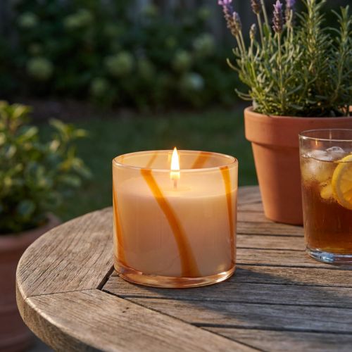 Duftkerze im Glas aus Wachs Ø8cm H8cm Creme-Orange mit Zitronenduft für Innen und Aussen | Floristik24.ch