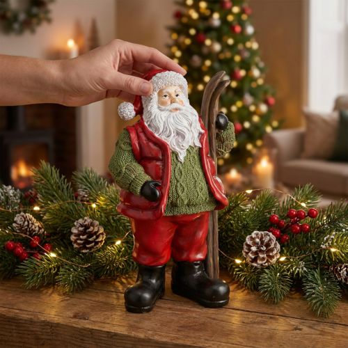 Weihnachtsmann Dekofigur mit Ski aus Polyresin 14×10,5×24,5cm Handbemalt | Floristik24.ch