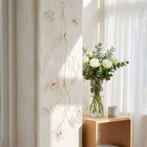 Metallgirlande mit Blumen aus