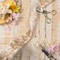 Geschenkband aus Polyester 40 mm breit 20 m cremefarben mit Pflanzenmotiven | Floristik24.ch