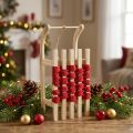 Deko-Schlitten aus Holz mit Jutekordel und rotem Filzband 30×14,5×9,5 cm | Floristik24.ch